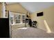 Bedroom with a bay window, a desk, and lots of natural light at 18273 E Arizona Ave # D, Aurora, CO 80017