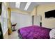 Bedroom features a vaulted ceiling, a large closet, and an ensuite bathroom at 18273 E Arizona Ave # D, Aurora, CO 80017