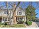 Charming townhouse featuring a well-maintained lawn and inviting entrance at 18273 E Arizona Ave # D, Aurora, CO 80017