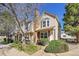 Attractive townhouse with a well-kept lawn and a welcoming front facade at 18273 E Arizona Ave # D, Aurora, CO 80017