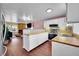 An open kitchen and living room with a fireplace providing an easy entertaining area at 18273 E Arizona Ave # D, Aurora, CO 80017