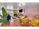 Open-concept living and dining area with modern furnishings and natural light at 18273 E Arizona Ave # D, Aurora, CO 80017