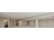 Basement features open floor plan, neutral tones, carpet, recessed lighting, and structural columns at 5424 Freddys Trl, Parker, CO 80134