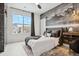 Bedroom with scenic wall art, large window and a ceiling fan at 6263 E 142Nd Pl, Thornton, CO 80602
