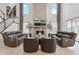 Bright living room with soaring ceilings, fireplace, sleek furniture, and stylish decor creates a welcoming space at 6263 E 142Nd Pl, Thornton, CO 80602
