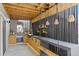 Enjoy the backyard in this outdoor kitchen featuring a built-in beverage cooler at 6263 E 142Nd Pl, Thornton, CO 80602