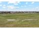 A large, open soccer field offers a recreational space within the residential community at 6263 E 142Nd Pl, Thornton, CO 80602