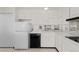 Functional kitchen with a full suite of appliances, including a dishwasher and refrigerator at 3131 E Alameda Ave # 1203, Denver, CO 80209