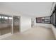 Open living room with balcony and lots of natural light at 3131 E Alameda Ave # 1203, Denver, CO 80209