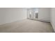 Spacious, bright room with carpeted floors and plenty of natural light at 3131 E Alameda Ave # 1203, Denver, CO 80209