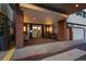 Well-lit building entrance with covered entryway and comfortable seating for visitors at 3131 E Alameda Ave # 1203, Denver, CO 80209