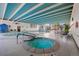 Indoor pool and hot tub with a retractable roof at 3131 E Alameda Ave # 1203, Denver, CO 80209