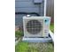 New air conditioning unit installed on concrete foundation and near the exterior wall of home at 3101 W Jefferson Ave, Englewood, CO 80110