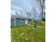 Cozy one-story home featuring a well-maintained lawn and a classic front door at 3101 W Jefferson Ave, Englewood, CO 80110