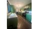 Well-equipped kitchen featuring stainless steel appliances, and granite countertops at 3101 W Jefferson Ave, Englewood, CO 80110