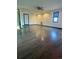 Open living space with hardwood floors, natural light, and modern fixtures at 3101 W Jefferson Ave, Englewood, CO 80110