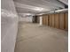 Unfinished basement featuring concrete floors and exposed beams, ready for customization at 4877 Cattle Cross Rd, Castle Rock, CO 80104