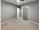 Spacious carpeted bedroom with en-suite bathroom access at 4877 Cattle Cross Rd, Castle Rock, CO 80104