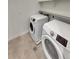 Convenient laundry area with modern washer and dryer at 4877 Cattle Cross Rd, Castle Rock, CO 80104