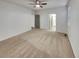 Large main bedroom with neutral carpet and a ceiling fan for added comfort at 4877 Cattle Cross Rd, Castle Rock, CO 80104