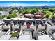 Aerial view highlighting townhomes with rooftop decks, showcasing outdoor living spaces at 3308 W 17Th Ave, Denver, CO 80204