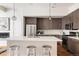 Modern kitchen featuring stainless steel appliances, a spacious island, and sleek cabinetry at 3308 W 17Th Ave, Denver, CO 80204