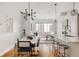 Bright and airy living space with a modern kitchen, dining area, and comfortable living room at 3308 W 17Th Ave, Denver, CO 80204