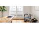 Bright office featuring a hardwood floor, zebra chair, and access to an outdoor balcony at 3308 W 17Th Ave, Denver, CO 80204