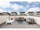 Chic rooftop patio with modern seating, stylish decor, and cityscape views at 3308 W 17Th Ave, Denver, CO 80204