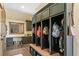 Well-organized mudroom with lockers, built-in bench, and storage for backpacks and shoes at 5722 S Benton Way, Littleton, CO 80123
