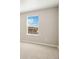 Bright bedroom with a large window and soft carpet for a comfortable space at 17881 East 94Th Ave, Commerce City, CO 80022