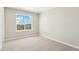 Bright bedroom featuring carpet floors and a window at 17881 East 94Th Ave, Commerce City, CO 80022