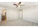 Spacious bedroom features plush carpet and connects to a stylishly appointed bathroom at 17881 East 94Th Ave, Commerce City, CO 80022