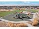 Community playground with swings, slides, and picnic shelter for outdoor recreation at 17881 East 94Th Ave, Commerce City, CO 80022