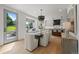 Dining area with modern light fixture and view of the backyard at 5698 Green Oaks Dr, Greenwood Village, CO 80121