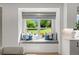 Cozy window seat with view of the backyard at 5698 Green Oaks Dr, Greenwood Village, CO 80121