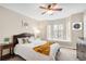 Comfortable bedroom with bay window and neutral decor for a relaxing atmosphere at 2958 N Xenia St, Denver, CO 80238