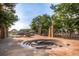 Picturesque community park with unique water features, sculptures, shaded seating areas, and lush landscaping at 2958 N Xenia St, Denver, CO 80238