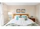 Tranquil bedroom featuring a comfortable bed, soft pillows, stylish decor, and a relaxing atmosphere at 2958 N Xenia St, Denver, CO 80238
