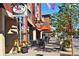 Charming street view featuring local shops, outdoor cafe seating, and a vibrant, welcoming atmosphere at 2958 N Xenia St, Denver, CO 80238