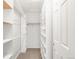 Walk-in closet with built-in shelving for optimal storage and organization at 2958 N Xenia St, Denver, CO 80238