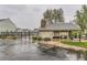 Community pool area with secure fencing and a convenient mail station, enhancing resident amenities at 5404 W Canyon Trl # C, Littleton, CO 80128