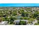 Beautiful aerial view of the community showcasing the serene pond and well-maintained surroundings at 12156 Melody Dr # 201, Westminster, CO 80234