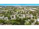 Aerial community view of apartments surrounding pond and walking path at 12156 Melody Dr # 201, Westminster, CO 80234