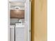 Laundry room features a washer, dryer, cabinets and a folding stool at 12156 Melody Dr # 201, Westminster, CO 80234