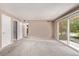 Bright living room with access to a balcony, providing a seamless indoor-outdoor flow at 12156 Melody Dr # 201, Westminster, CO 80234