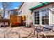 Cozy backyard deck with seating, bistro table, and covered awning for outdoor entertaining at 1578 S Syracuse St, Denver, CO 80231