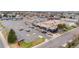 Aerial view of a shopping center with convenient parking, offering a variety of shops and amenities at 1074 S Dearborn St # 103, Aurora, CO 80012