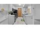 Modern kitchen featuring stainless steel appliances, ample cabinet space, and a bright, clean design at 1074 S Dearborn St # 103, Aurora, CO 80012