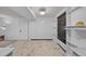 Open living space features durable floors, built-ins, and chalkboard for customizable decor at 1074 S Dearborn St # 103, Aurora, CO 80012